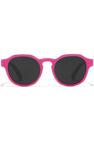 Hawkers WARWICK KIDS. Gafas de Sol para Niños. Color: Rosa. Tipo de gafas: Redondas