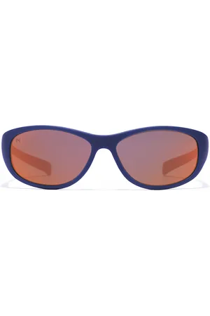 Hawkers RAVE KIDS. Gafas de Sol para Niños. Tipo de gafas: Clásicas, Rectangulares. Color: Azul