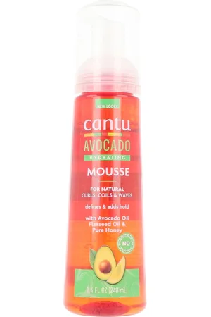 Cantu AVOCADO HYDRATING styling mousse. Tratamiento hidratante pelo - Definición de rizos afro - Producto de peinado. Tipo de Cabello: Cabello Rizado. Texturas: Espuma/Mousse. Formulación: Sin Parabenos, Sin Sulfatos, Sin Siliconas. Formato: Dosi