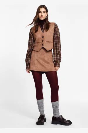 Please Falda corta efecto suede con cintura media
