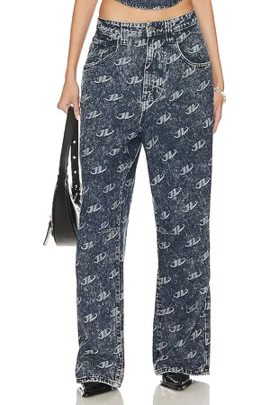 REVOLVE Jaded London Jaded london pantalones holgados monogram en color denim-medium talla 26 en - Denim-Medium. Talla 26 (también en 28).