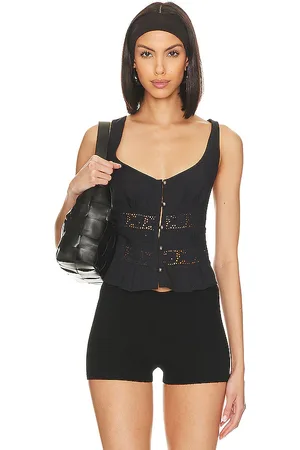 REVOLVE Free People Free people camiseta tirantes encaje free people kianna en color talla L en - Black. Talla L (también en XL).