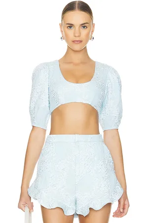 REVOLVE Camila Coelho Camila coelho kahlo crop top en color bebe azul talla XL en - Baby Blue. Talla XL (también en XS, XXS).