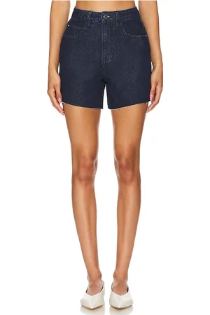 REVOLVE WeWoreWhat Weworewhat high rise flare short en undone wash en color denim-dark talla 24 en - Denim-Dark. Talla 24 (también en 25, 26, 29).
