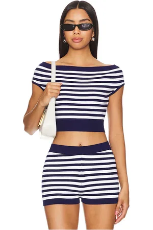 REVOLVE Le Superbe Le superbe x off the shoulder crop top en color azul marino talla L en - Navy. Talla L (también en M).