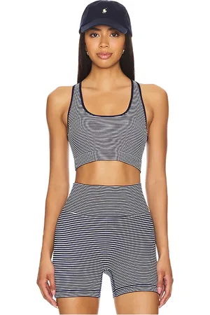 REVOLVE WellBeing + BeingWell Wellbeing + beingwell sujetador deporte stretchwell aire en color azul marino talla L/XL en - Navy. Talla L/