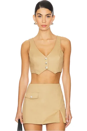 REVOLVE Amanda Uprichard Amanda uprichard chaleco cropped ethan en color beige talla L en - Beige. Talla L (también en M, S).