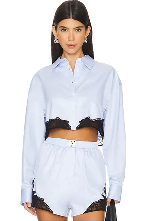 REVOLVE Fleur du mal Fleur du mal camisa cropped en color bebe azul talla L en - Baby Blue. Talla L (también en M).