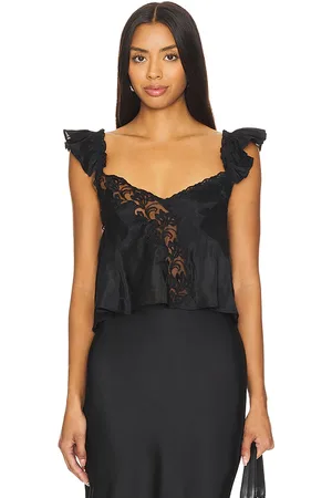 REVOLVE Free People Free people camiseta tirantes encaje free people harmony en color negro talla M en - Black. Talla M (también en XL).