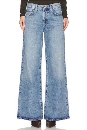 REVOLVE AGOLDE Agolde campana holgada de talle bajo clara en color denim-medium talla 27 en - Denim-Medium. Talla 27 (también en 28, 29, 30, 32, 33, 34