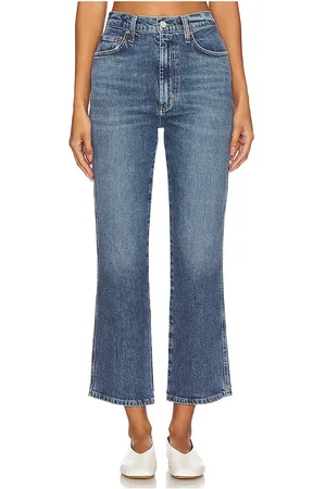 REVOLVE AGOLDE Agolde pantalones acampanados de tiro alto pinch waist en color denim-medium talla 25 en - Denim-Medium. Talla 25 (también en 26, 27