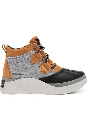 REVOLVE Sorel Sorel bota caribou en color marrón talla 6 en /Black - Brown. Talla 6 (también en 6.5, 8, 8.5, 9).