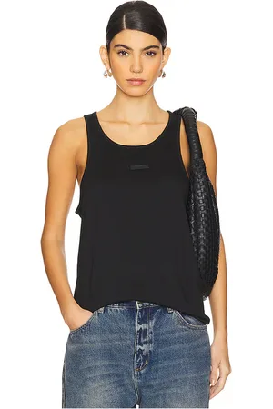 REVOLVE Fear of God ESSENTIALS Fear of god essentials camiseta tirantes en color talla L en - Black. Talla L (también en M, S, XS).