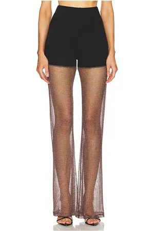 REVOLVE AAIZEL Aaizel pantalón acampanado con contraste transparente y brillante en color negro talla 10/M en - Black. Talla 10/M (también en 8