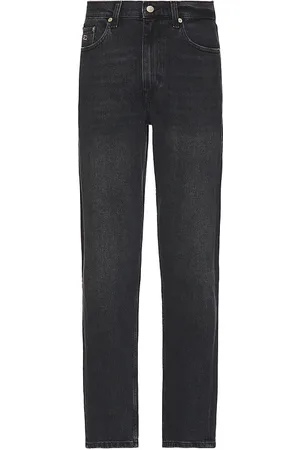 REVOLVE Tommy Jeans Tommy jeans isaac relaxed tapered dh6182 jeans en color negro talla 30 en - Black. Talla 30 (también en 32, 34).