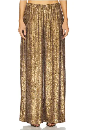 REVOLVE Norma Kamali Norma kamali pantalón deportivo tipo boyfriend con estampado de elefante. en color metálico talla M en - Metallic Bronze. T