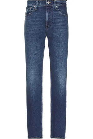 REVOLVE Tommy Jeans Tommy jeans ryan slim straight jeans en color azul talla 30 en - Blue. Talla 30 (también en 32, 34, 36).
