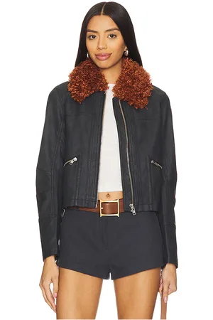 REVOLVE Free People Free people chaqueta de piel sintética con ribete de piel sintética free people jayce en color negro talla L en - Black. Talla