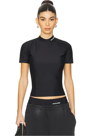 REVOLVE Alexander Wang Alexander wang camiseta rashguard de manga corta en color talla S en - Black. Talla S (también en XS).