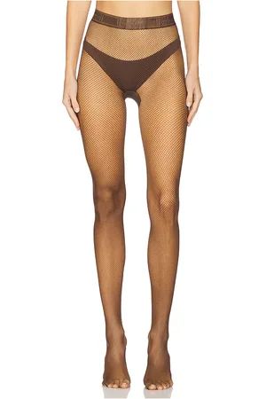 REVOLVE Wolford Wolford medias twenties econyl en color marrón talla L en - Brown. Talla L (también en M, S, XS).