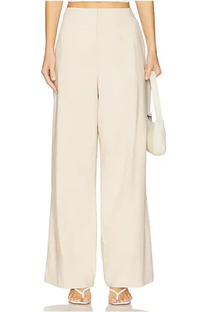 REVOLVE SOVERE Sovere pantalón vaquero pierna ancha en color ivory talla L en - Ivory. Talla L (también en M, S, XL/1X, XS).