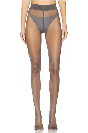 REVOLVE Wolford Wolford medias touch 20 en color gris talla S en - Grey. Talla S (también en XS).
