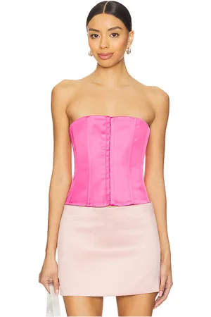 REVOLVE GUIZIO Guizio satin lace up corset en color rosado talla L en - Pink. Talla L (también en M, S, XS, XXS).