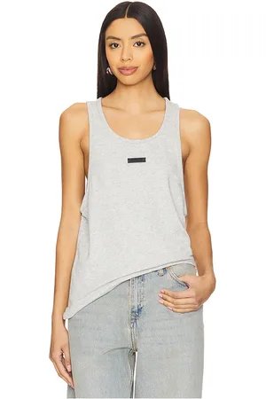 REVOLVE Fear of God ESSENTIALS Fear of god essentials top sin mangas en color gris talla L en - Grey. Talla L (también en M, S, XL, XS, XXS