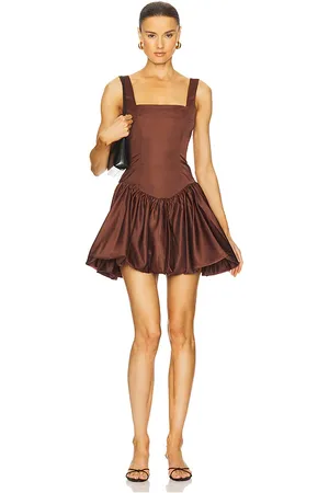 REVOLVE WeWoreWhat Weworewhat mini vestido con dobladillo abullonado en color marrón talla 0 en - Brown. Talla 0 (también en 00, 2, 4, 6, 8).
