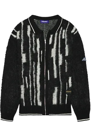 REVOLVE Deva States Deva states ikat long sleeve knitted zip-up polo en color marino talla L en - Navy. Talla L (también en M).