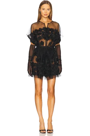 REVOLVE Norma Kamali Norma kamali vestido mini acampanado sin mangas super os en color talla M en - Black. Talla M (también en S, XS, XXS).