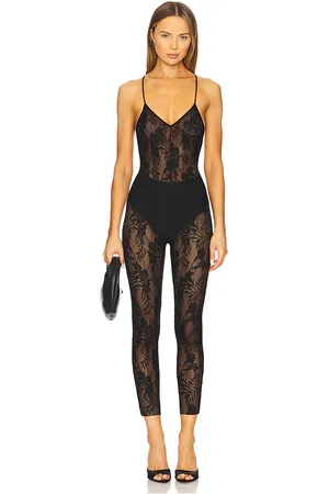 REVOLVE Norma Kamali Norma kamali catsuit de tirantes con escote bajo en la espalda fara en color talla S en - Black. Talla S (también en XS).
