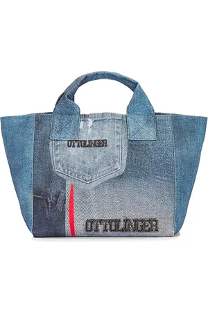 REVOLVE Ottolinger Ottolinger bolso de mano de mezclilla maxi en color azul talla all en - Blue. Talla all.