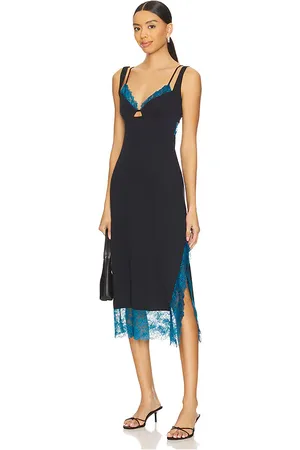 REVOLVE Free People Free people vestido tipo lencería largo medio party crasher en color negro talla L en - Black. Talla L (también en M, S, XL, X