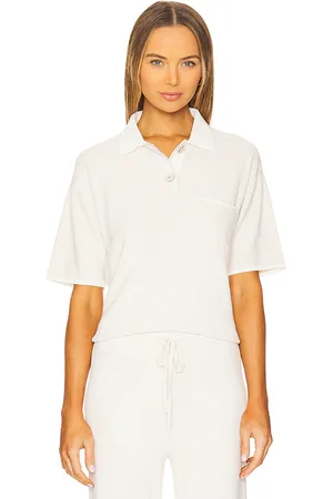 REVOLVE Barefoot Dreams Barefoot dreams top manga corta cozychic ulra light en color ivory talla L en - Ivory. Talla L (también en M, S, XL