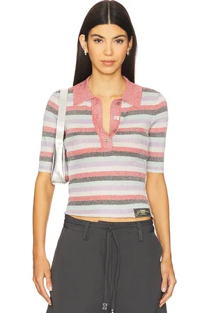 REVOLVE Ganni Ganni top tipo polo con canalé y brillo claro. en color rojo talla M en - Red. Talla M (también en S, XS).