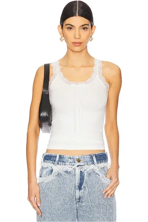 REVOLVE Tanner Fletcher Tanner fletcher top sin mangas flo lace trim en color talla L en - White. Talla L (también en M, S, XS).
