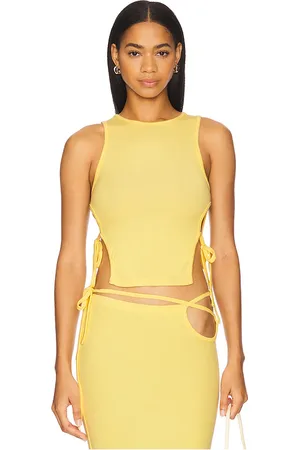 REVOLVE BY.DYLN By.dyln x len top en color amarillo talla L en - Yellow. Talla L (también en M, S, XL).