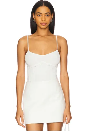 REVOLVE Fleur du mal Fleur du mal body de punto con tirantes finos bajo el busto en color blanco talla L en - White. Talla L (también en M, S, XS).