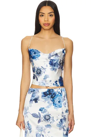 REVOLVE Alice + Olivia Alice + olivia top recortado valentina en color azul talla 0 en - Blue. Talla 0 (también en 10, 12, 2, 4, 6, 8).