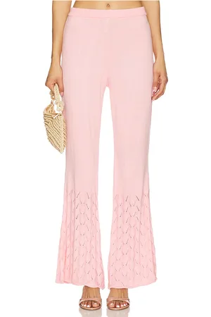 REVOLVE Agua Bendita Agua bendita pantalón acampanado en color rosado talla L en - Pink. Talla L (también en M, S, XL, XS).