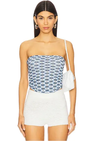 REVOLVE Free People Free people top sin tirantes boulevard en color azul talla L en - Blue. Talla L (también en M, S, XL, XS).