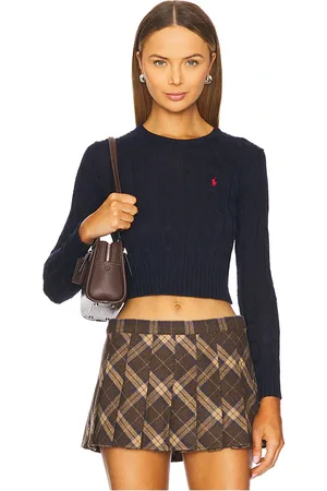 REVOLVE Polo Ralph Lauren Polo ralph lauren suéter corto de algodón con punto trenzado en color azul marino talla L en - Navy. Talla L (también en