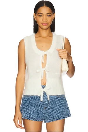 REVOLVE Ganni Ganni chaleco de mohair con lazo en color ivory talla L en - Ivory. Talla L (también en M, S, XS).
