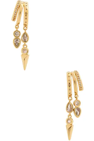 REVOLVE Ettika Ettika pendientes largos royal en color oro metálico talla all en - Metallic Gold. Talla all.