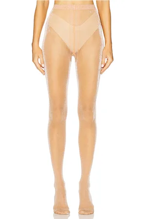 REVOLVE Wolford Wolford medias brillantes en color bronce talla L en - Tan. Talla L (también en M, S, XS).