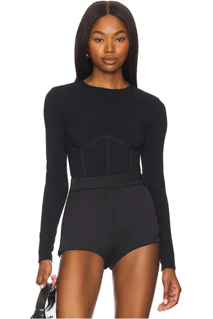 REVOLVE Fleur du mal Fleur du mal body de camiseta de manga larga organic cotton en color talla L en - Black. Talla L (también en M, XL, XS).