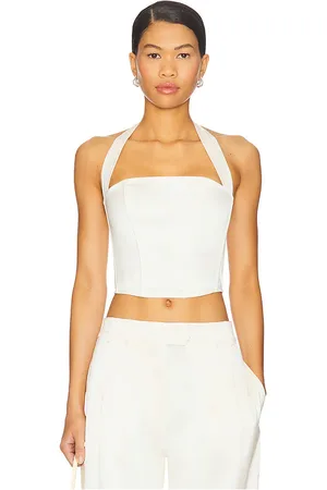 REVOLVE Fleur du mal Fleur du mal top de corsé con cuello halter de satén en color crema talla 2 en - Cream. Talla 2 (también en 4, 6).