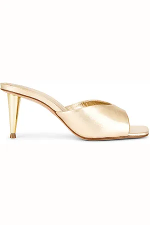 REVOLVE Schutz Schutz sandalia dethalia pin heel en color oro metálico talla 10 en - Metallic Gold. Talla 10 (también en 6, 6.5, 7, 7.5, 8, 8.5, 9.5).