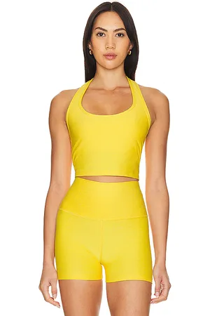 REVOLVE Beyond Yoga Beyond yoga camiseta sin mangas recortada spacedye well rounded en color amarillo talla M en - Yellow. Talla M (también
